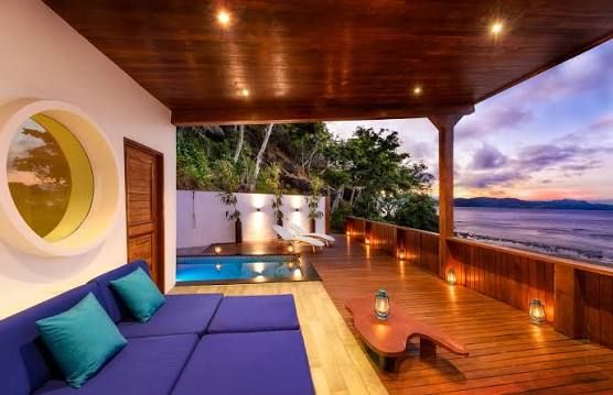 A person relaxing in a tropical infinity pool